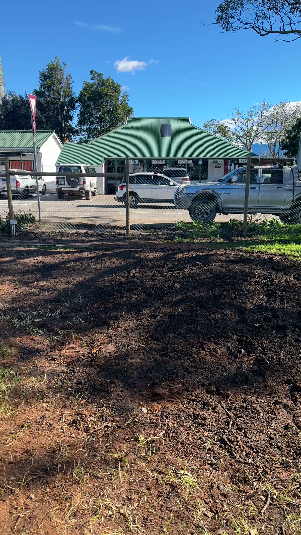 Compost yard with processed wood waste